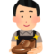 靴磨き店員